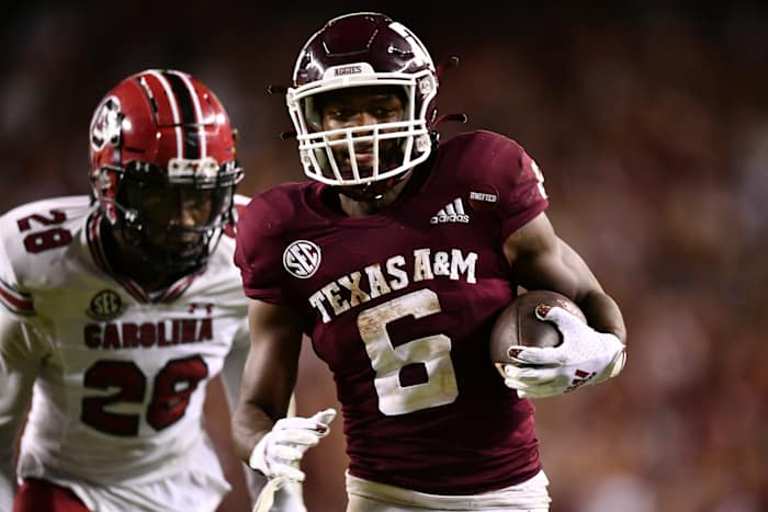 Oct 23, 2021; College Station, Texas, USA; Texas A&M Aggies running back Devon Achane (6) runs the ball in for a touchdown during the third quarter against the South Carolina Gamecocks at Kyle Field. Mandatory Credit: Maria Lysaker-USA TODAY Sports